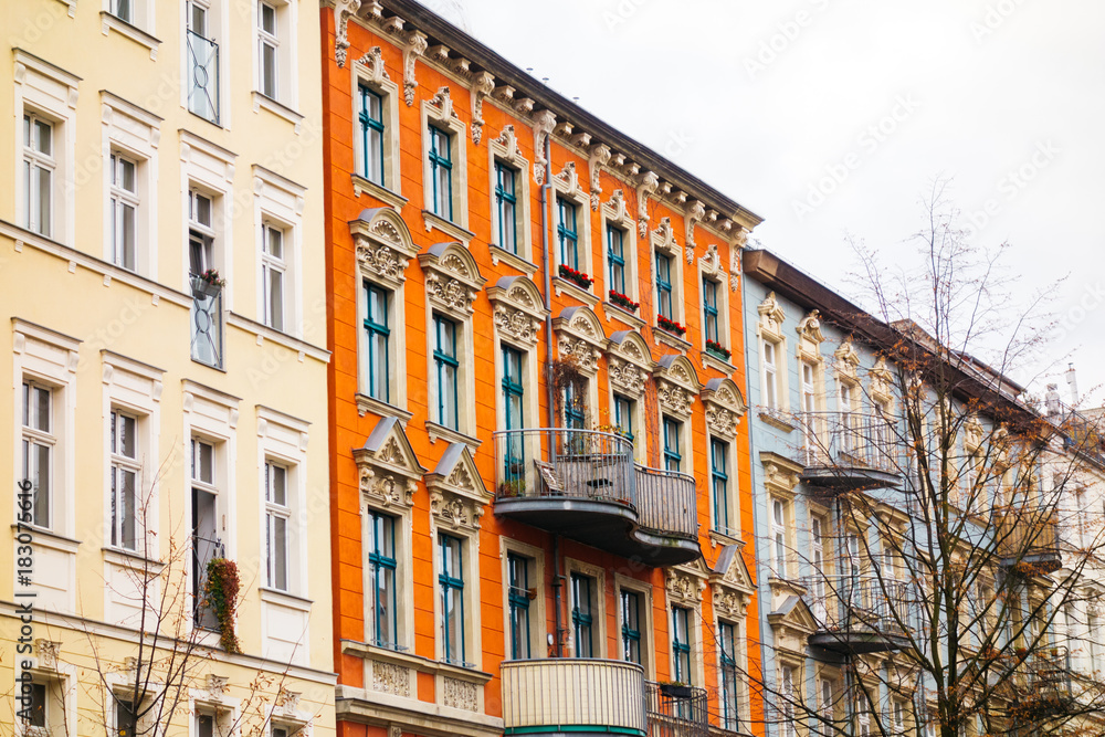 Classical ornate townhouse with orange facade