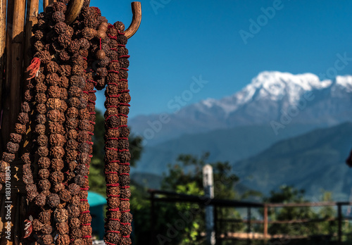 Nepalese prayer rosaries with red thread, Pokhara, Nepal photo