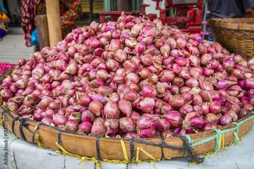 Onions in a basket on the market