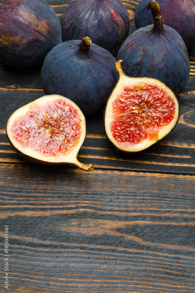 Fig isolated on wooden background Fig isolated on wooden background