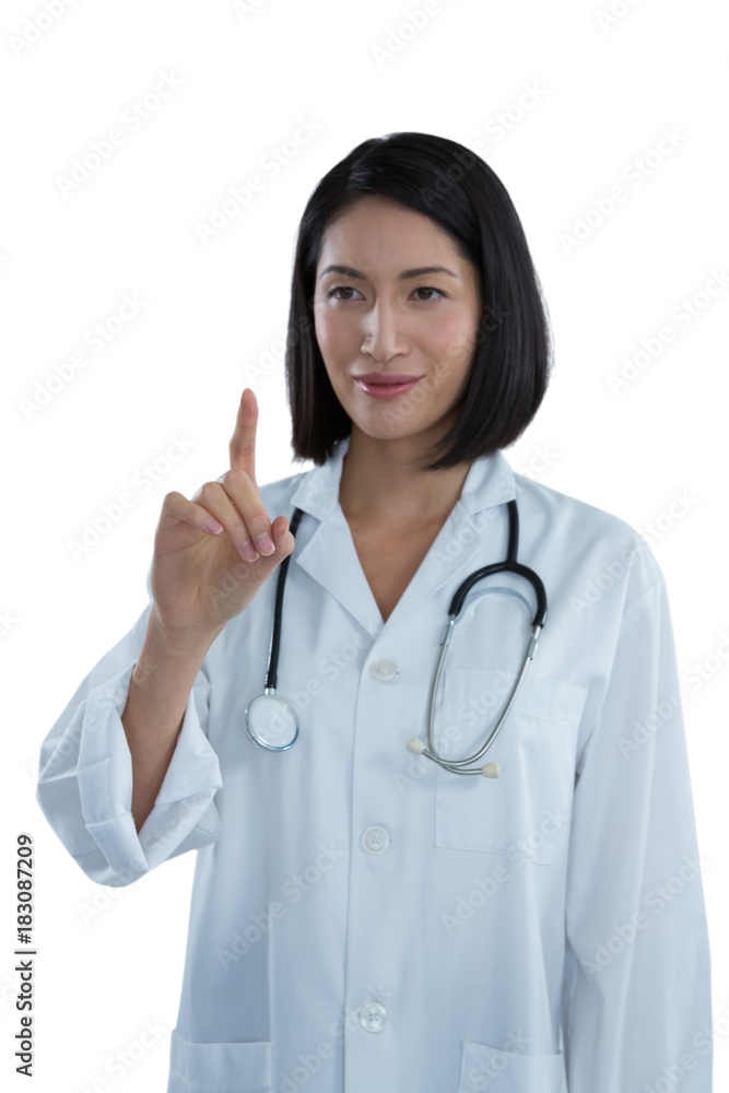 Female doctor touching invisible screen Female doctor touching invisible screen