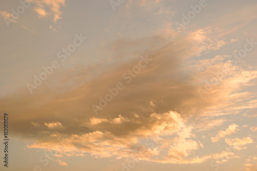 Horizontal photo of a beautiful sunset sky rich in orange clouds and warm tones © CMH