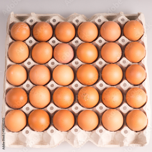 brown chicken eggs in carton