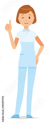 A female nurse wearing a white uniform is doing a good sign