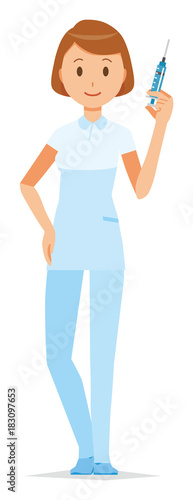 A female nurse wearing a white uniform has a syringe