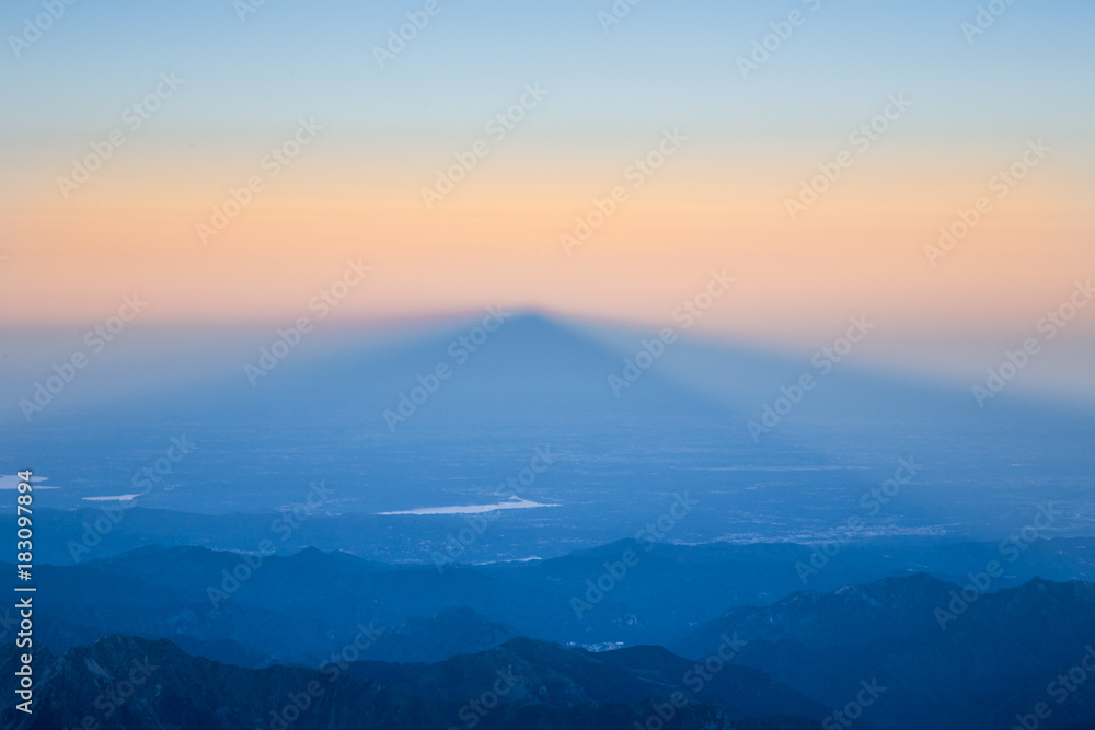 Shadow of a mountain peak at sunrise