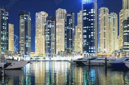 Illumination of night Dubai cityscape