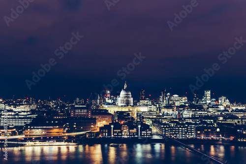 Photography Aerial view of London cityscape skyline at night with St Paul's Cathedral