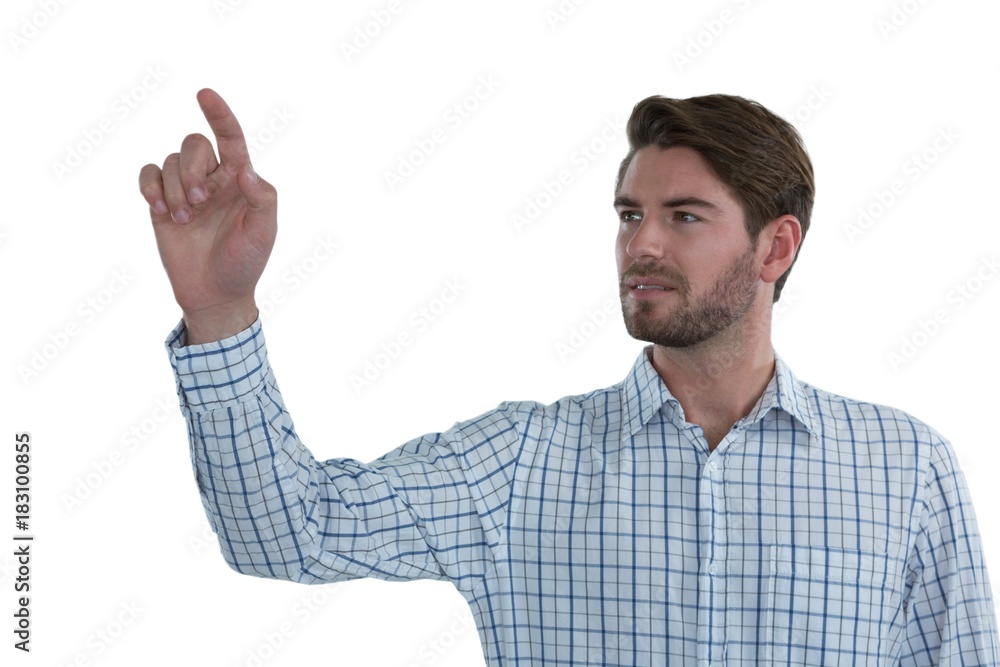 Man pretending to touch an invisible screen Man pretending to touch an invisible screen
