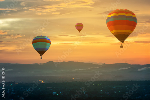 Hot air balloon in the sky sunset background