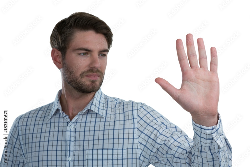 Man gesturing stop sign against white background Man gesturing stop sign against white background