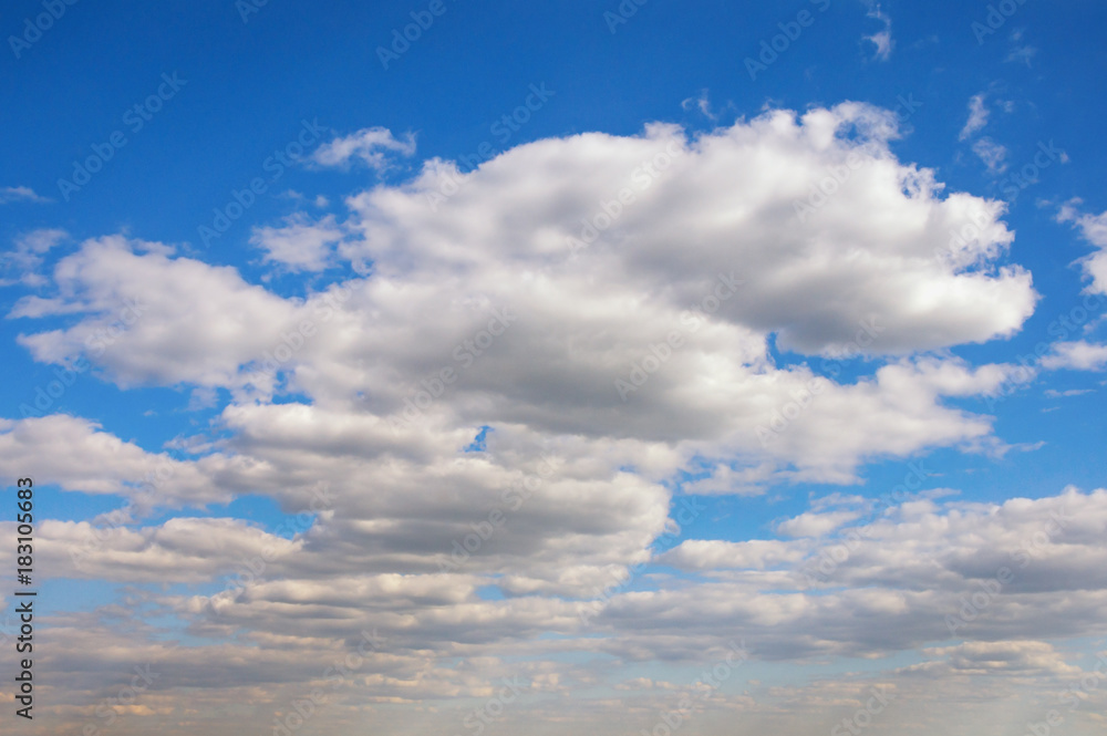 White Cumulus clouds in blue sky, perspective view White Cumulus clouds in blue sky, perspective view