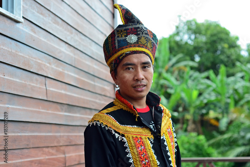 Portrait of Malaysian Native Man From Sabah Borneo in Traditional Costume.
