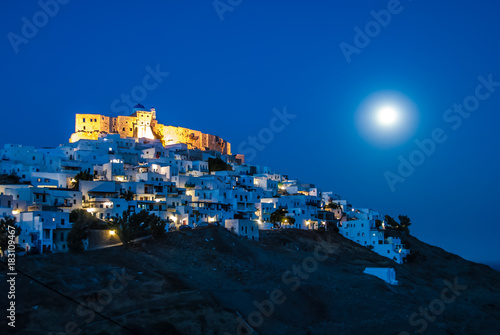 Panoramic view of  the Venetian castle on a full moon night in Astypalaia, an Aegean island of Greece © Haris Andronos
