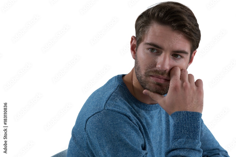 Man sitting against white background