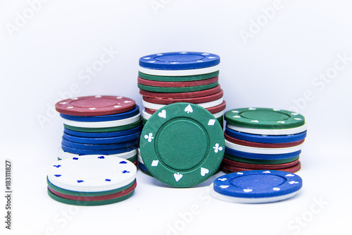 Chips for poker game on white background