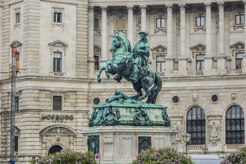 Fototapeta premium Equestrian statue (1865) of Prince Eugene of Savoy (general of the Imperial Army and statesman of the Holy Roman Empire) in front of Hofburg palace. Vienna, Austria.