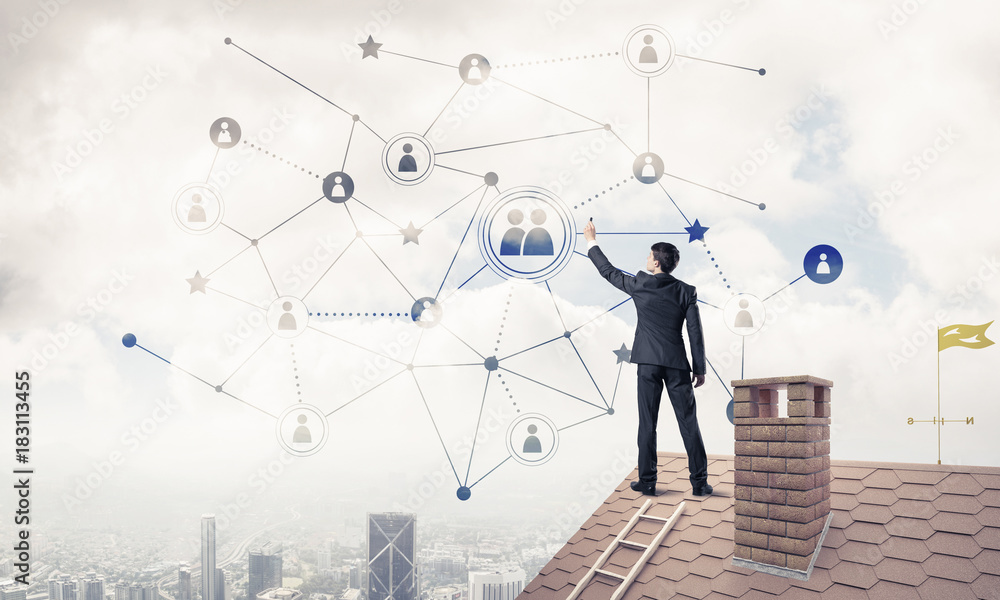 Businessman on house roof presenting networking and connection c Businessman on house roof presenting networking and connection c