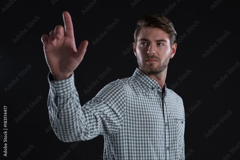 Man using invisible screen Man using invisible screen