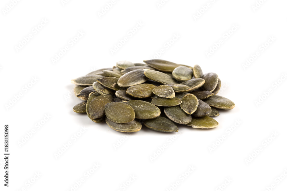 Pumpkin seeds on a white background Pumpkin seeds on a white background