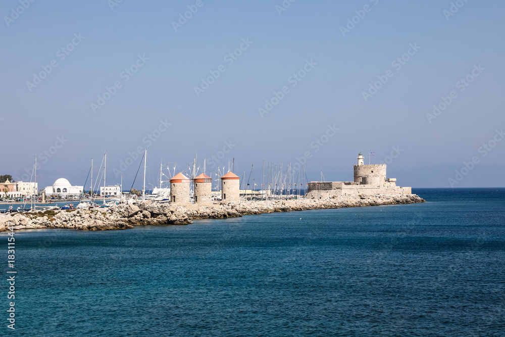 Mandhraki Harbor, the yacht and ferry harbour in the city of Rhodes in Greece