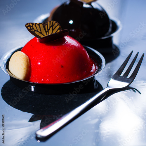 Konstfotografi French pastry small ball cakes made with fresh strauberry and truffel creme