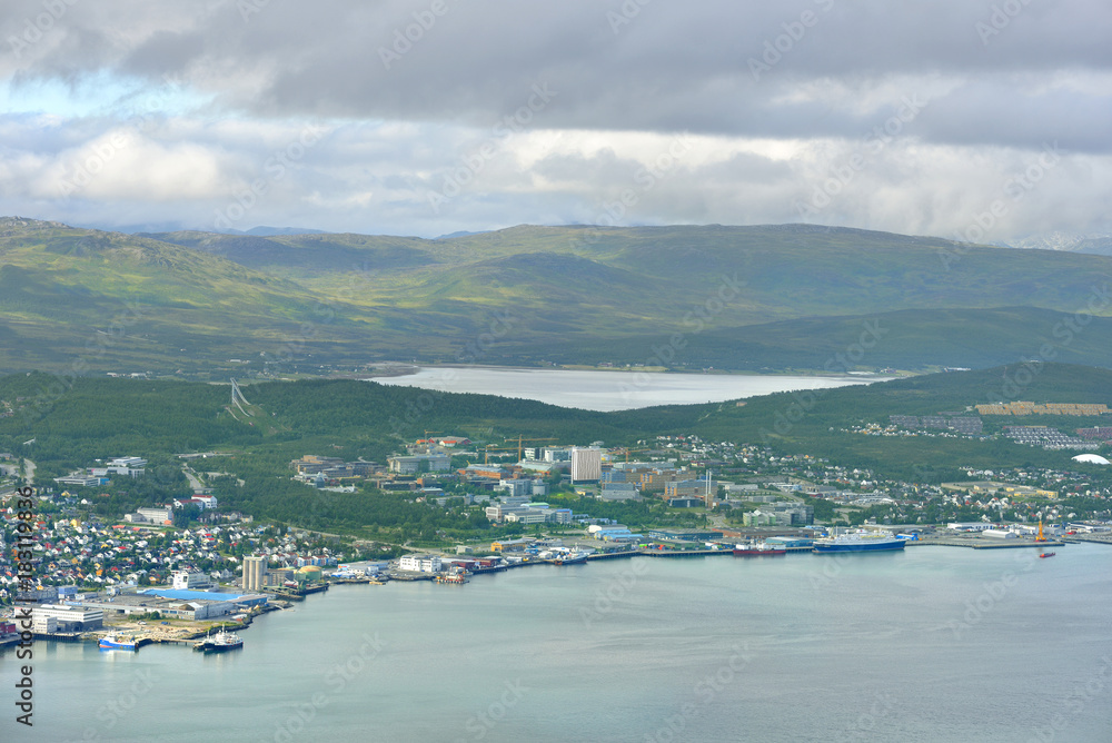 View of Tromso on island of Tromsoya and picturesque mountains on island of Kvaloya. Northern Norway