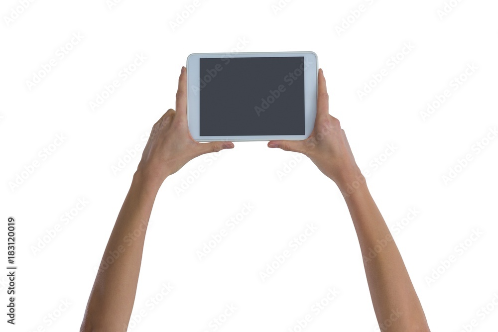 Womans hand holding digital tablet Womans hand holding digital tablet