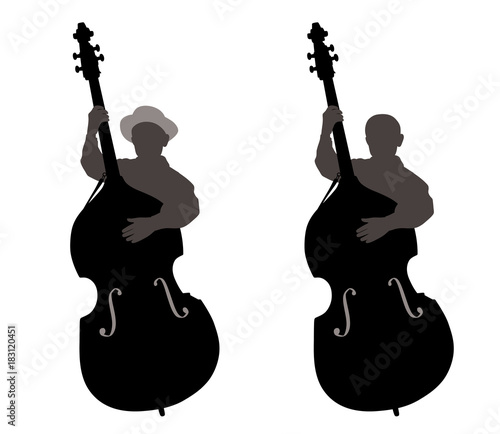 Boy standing behind a contrabass