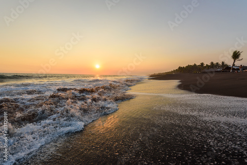 Sunset at Beach with Black Sand in Monterrico, Pacific coast of Guatemala. 