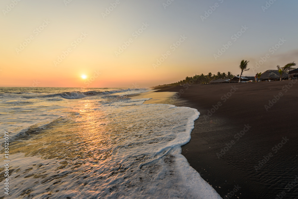 Sunset at Beach with Black Sand in Monterrico, Pacific coast of Guatemala. Sunset at Beach with Black Sand in Monterrico, Pacific coast of Guatemala.