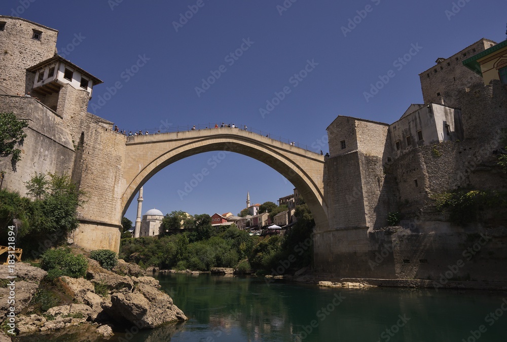 Famous and beautiful old bridge over the Neretva river in Mostar city in Bosnia and Herzegovina country build in medieval age, destroyed during the balkan wars by croatian army and rebuild again. 