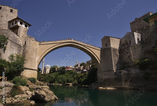 Famous and beautiful old bridge over the Neretva river in Mostar city in Bosnia and Herzegovina country build in medieval age, destroyed during the balkan wars by croatian army and rebuild again. 