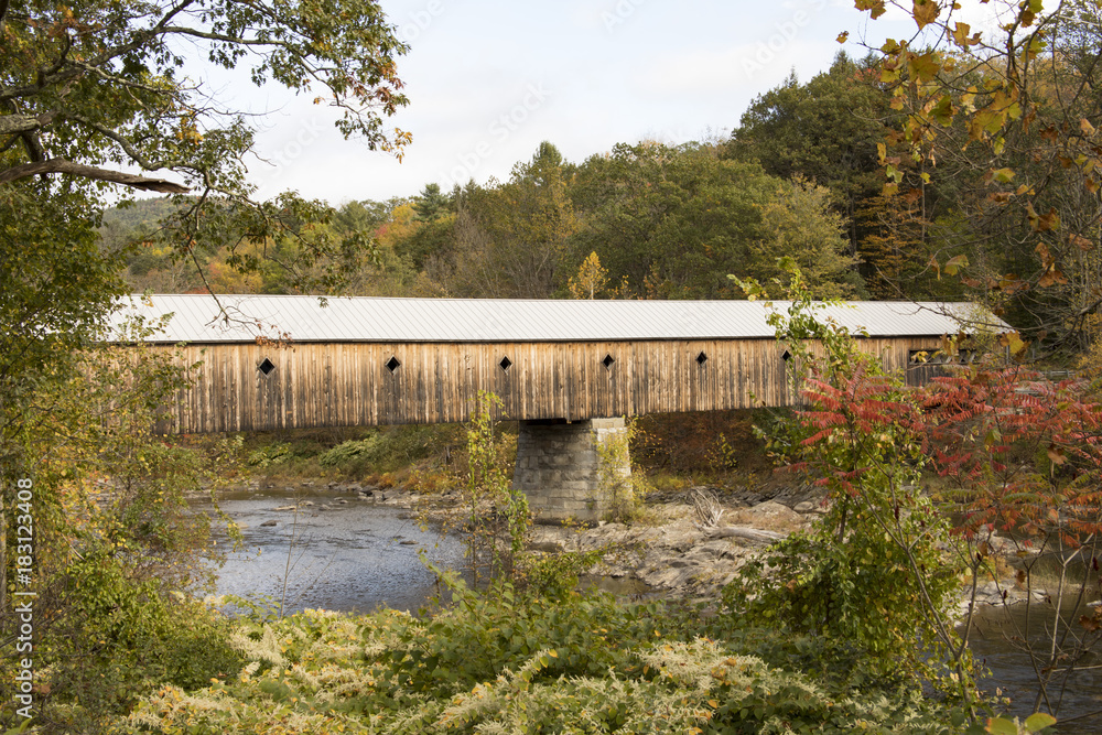 Covered bridge in rural Vermont in fall Covered bridge in rural Vermont in fall