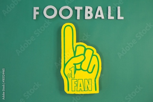 Foam hand on green background photo