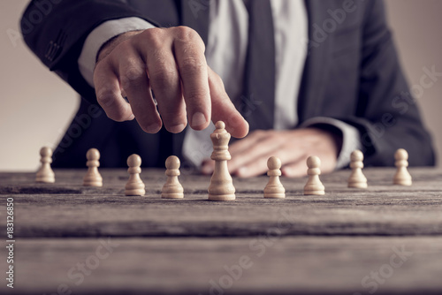 Wallpaper Mural Man wearing suit moving queen piece Torontodigital.ca