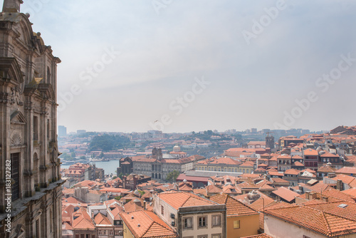 Facade of the Church of the Grilos and view of the city of Porto