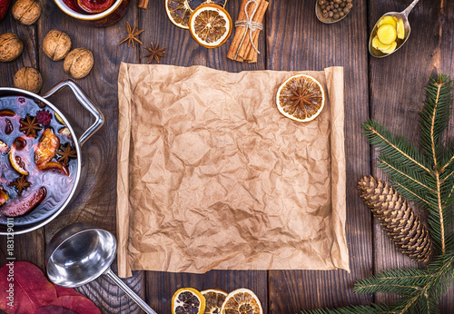 brown paper and ingredients for making mulled wine