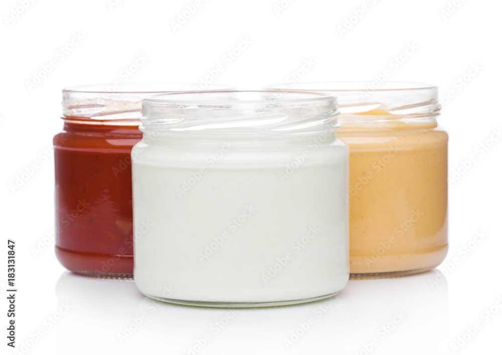 Glass containers with different nacho sauce Glass containers with different nacho sauce