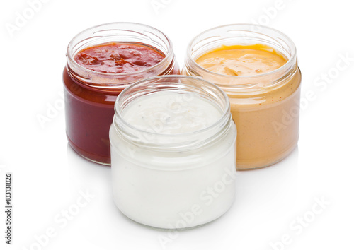 Glass containers with different nacho sauce