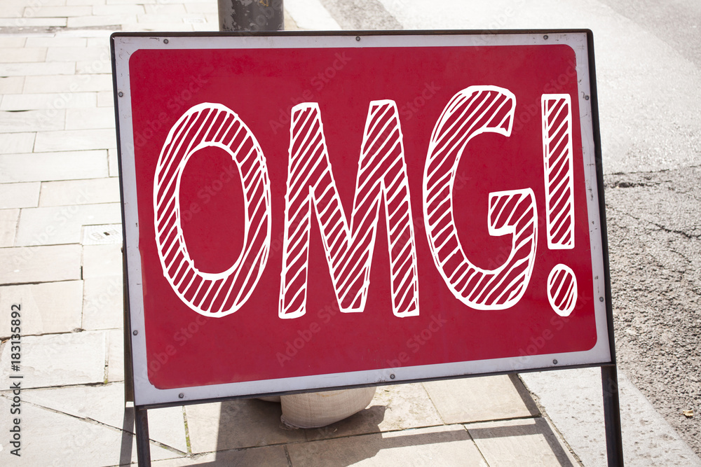 Obraz premium Conceptual hand writing text caption inspiration showing OMG Oh My God. Business concept for Surprise Humor written on announcement road sign with background and copy space