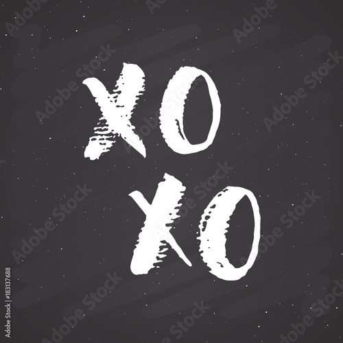 XOXO brush lettering sign, Grunge calligraphiv c hugs and kisses Phrase, Internet slang abbreviation XOXO symbols, vector illustration on chalkboard background