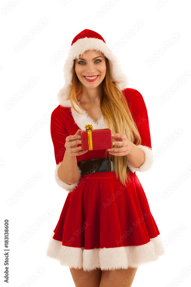 Beautiful young woman in santa claus dress hods a present isolated over white background Beautiful young woman in santa claus dress hods a present isolated over white background
