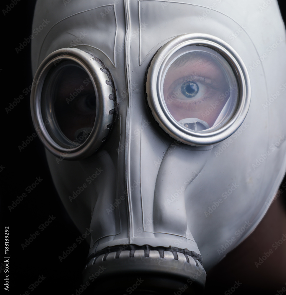 portrait of man in a gas mask