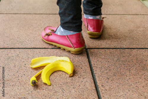 Banana peel on the footpath. May cause us to be harmed by slipping. photo