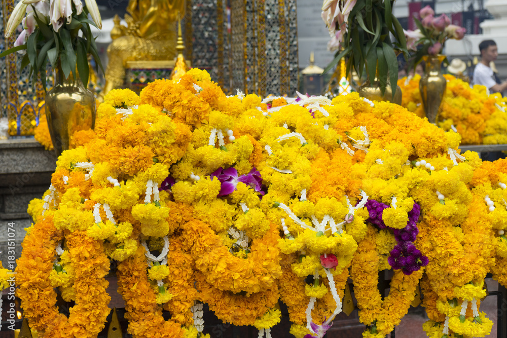 Fototapeta premium The Golden four-faced Brahma Shrine Phra Phrom at Erawan Temple in Bangkok Thailand.