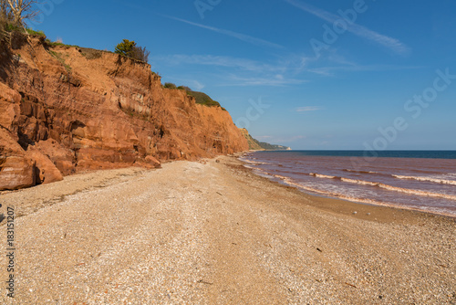 Cliffs and pebble beach  seen from The Esplanade  Sidmouth  Jurassic Coast  Devon  UK