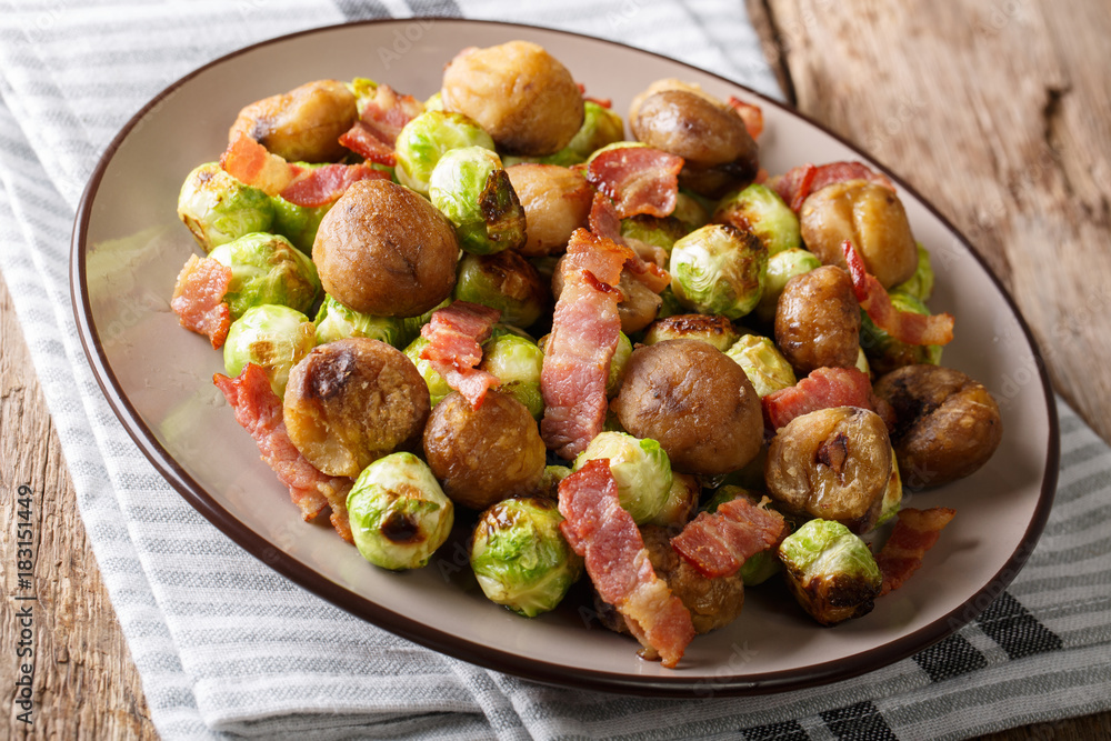 hearty salad of chestnuts, Brussels sprouts and bacon close-up. horizontal hearty salad of chestnuts, Brussels sprouts and bacon close-up. horizontal