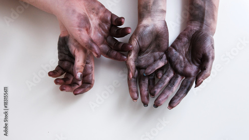 Two pairs of dirty woman hands on white background. Gender borders erased in modern working sphere