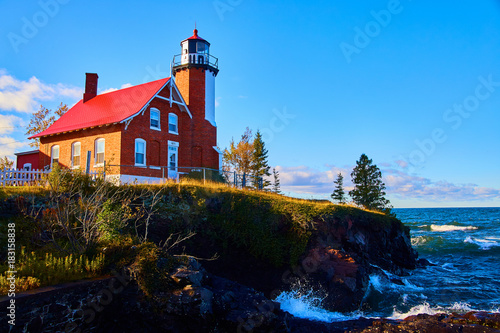Lighthouse on Rocky Cost with Lake Superior Eagle Harbor photo